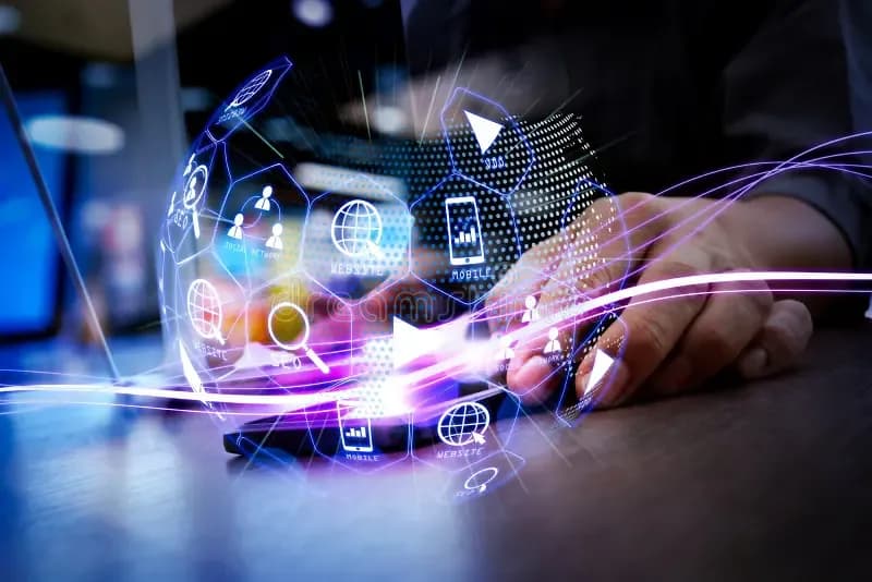 Hands on a phone with a holographic globe and digital icons.
